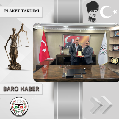 Av. M. Gökhan UĞUREL' e Plaket Takdimi